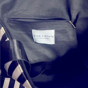 Alice and Olivia black and white striped fashion duffle bag